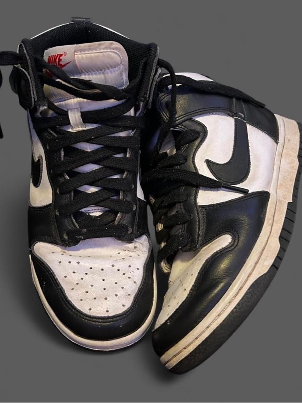 Nike Black and White High-Top Sneakers with Swoosh